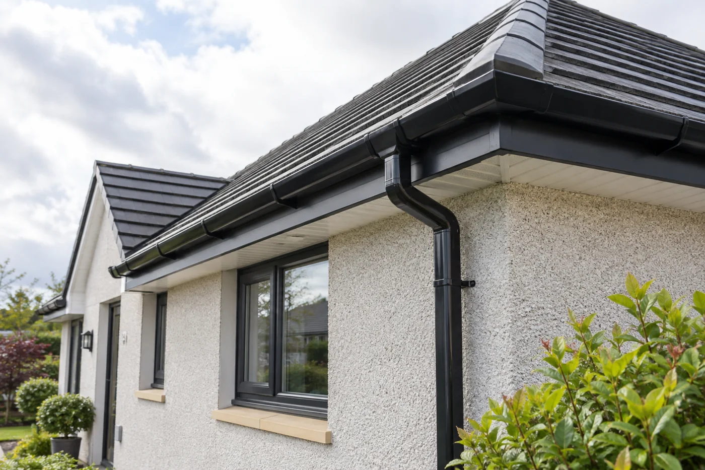 Gutter, fascia and downpipe connection