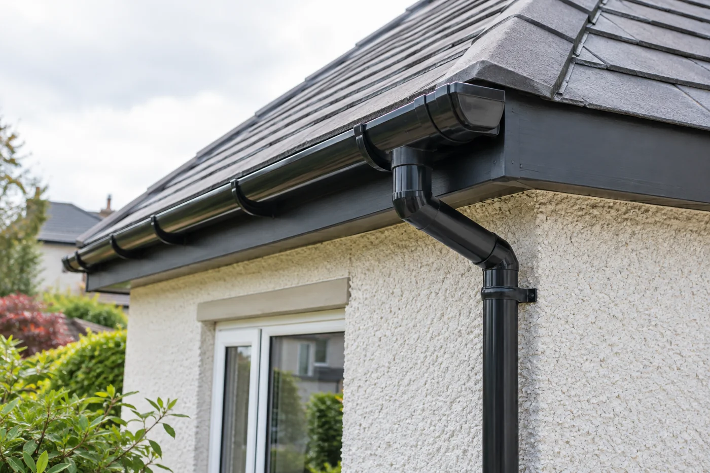 Guttering and fascia beneath domestic eaves
