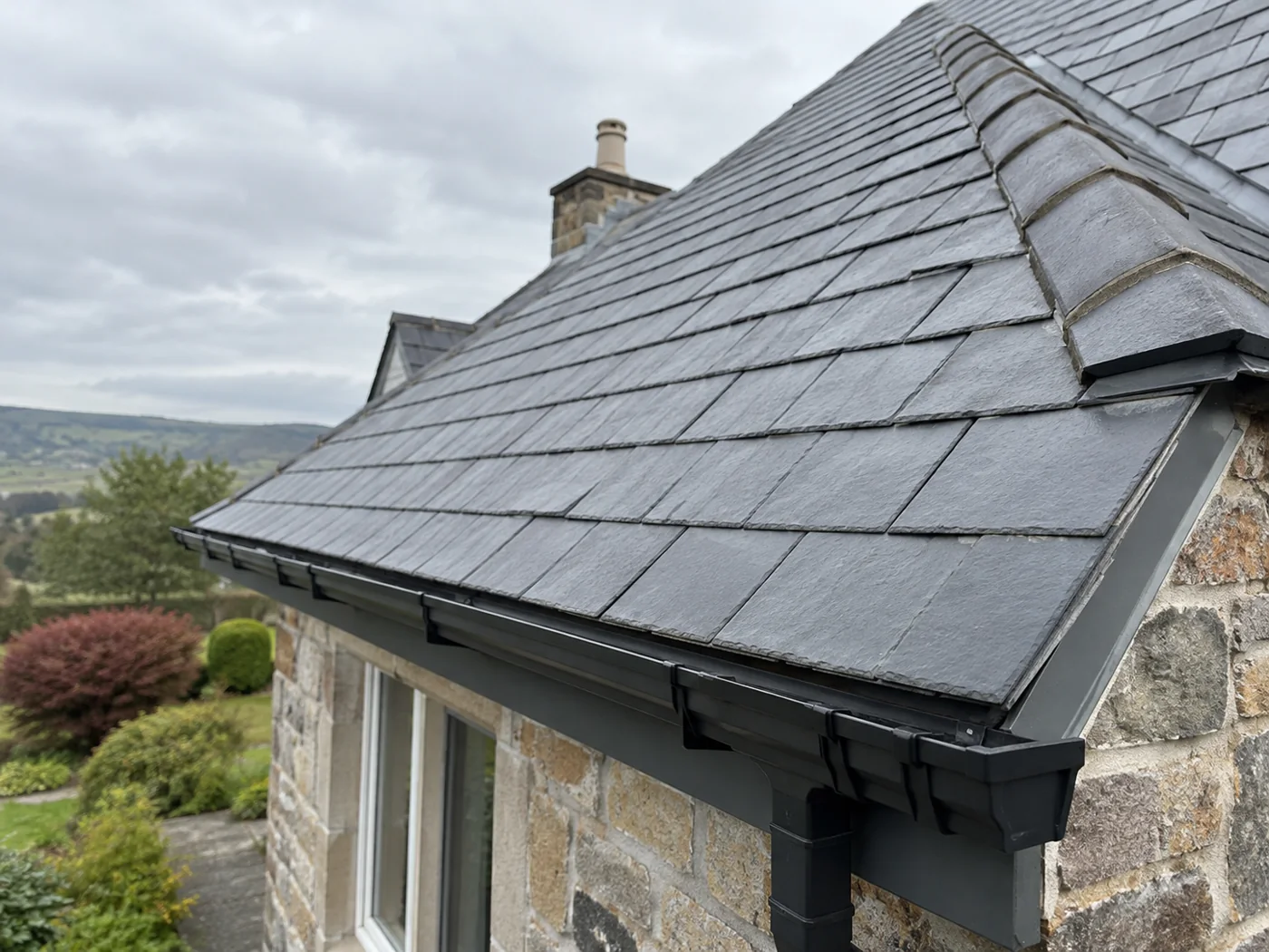 Natural slate roof eaves and gutter edge